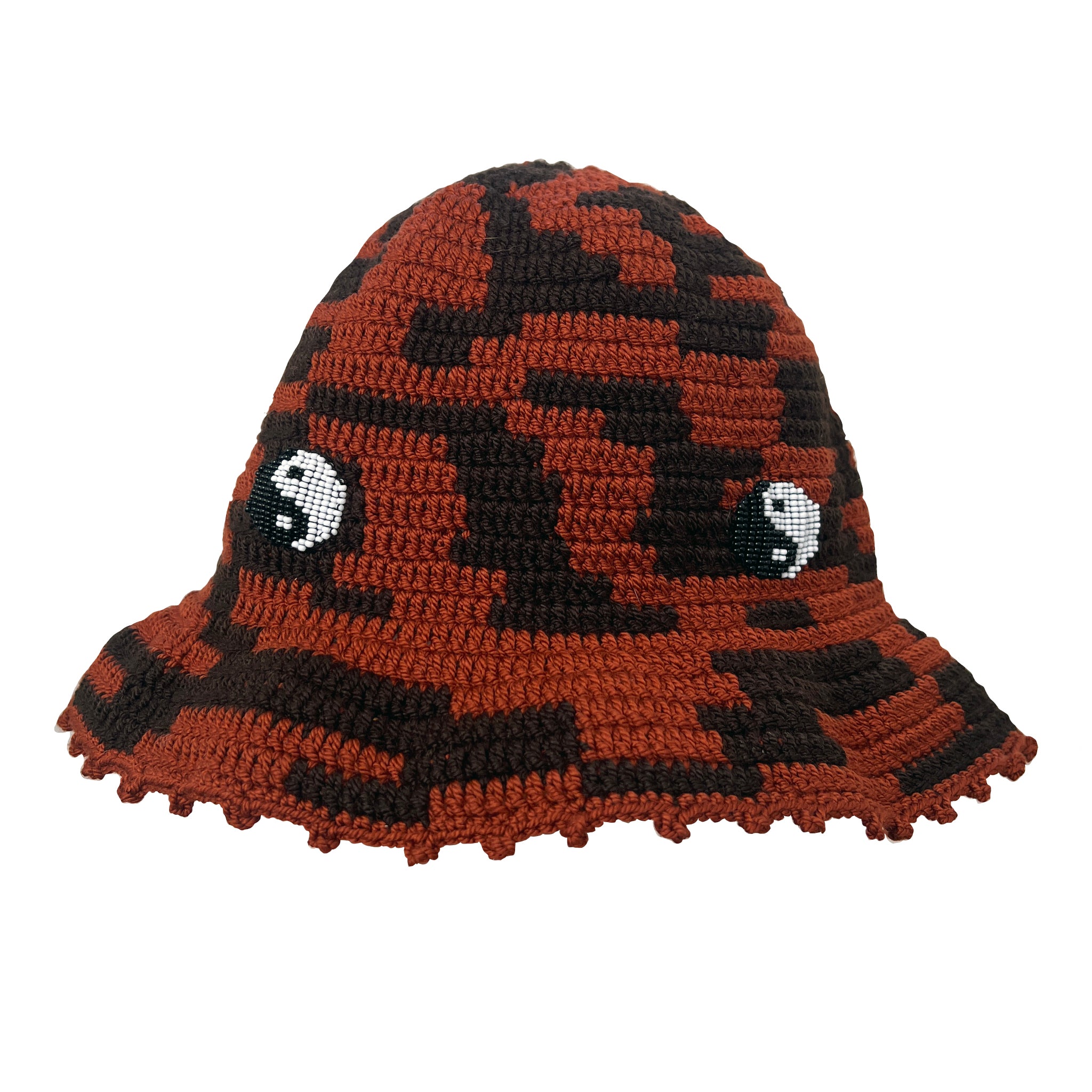 borwn and dark brown crochet hat with yin yang beaded embellishments