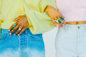 Multi colour swirl beaded rings on hand models